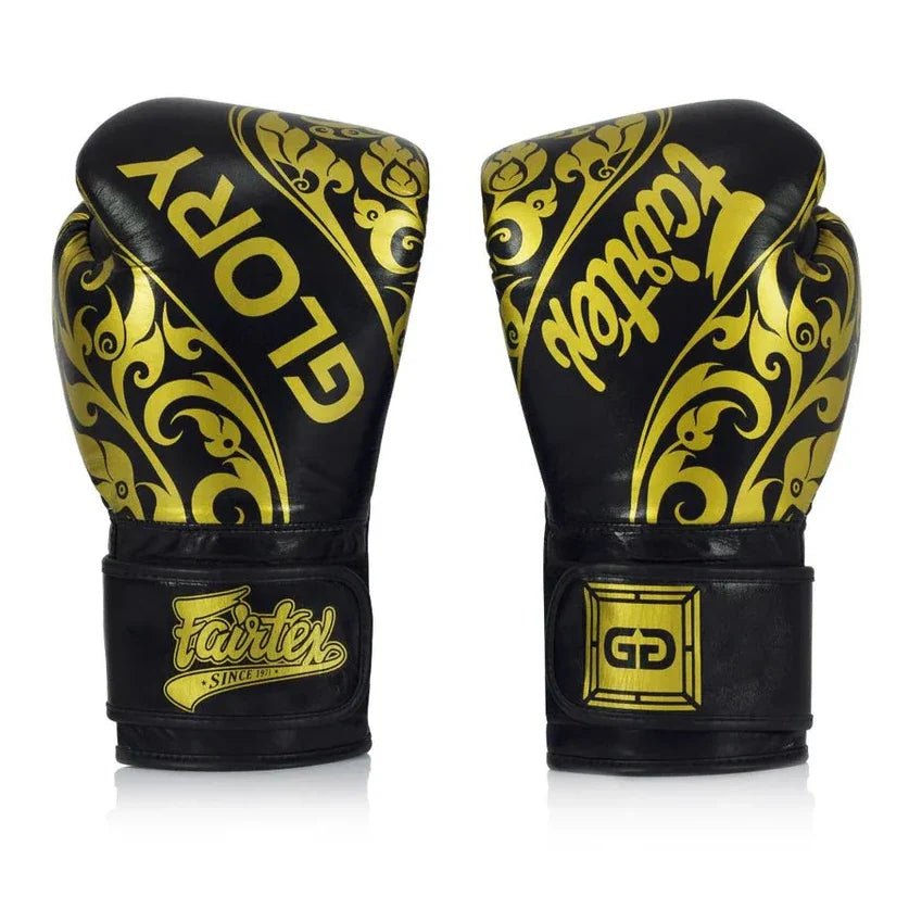 Black and yellow boxing gloves with 'Fairtex' branding on a white background