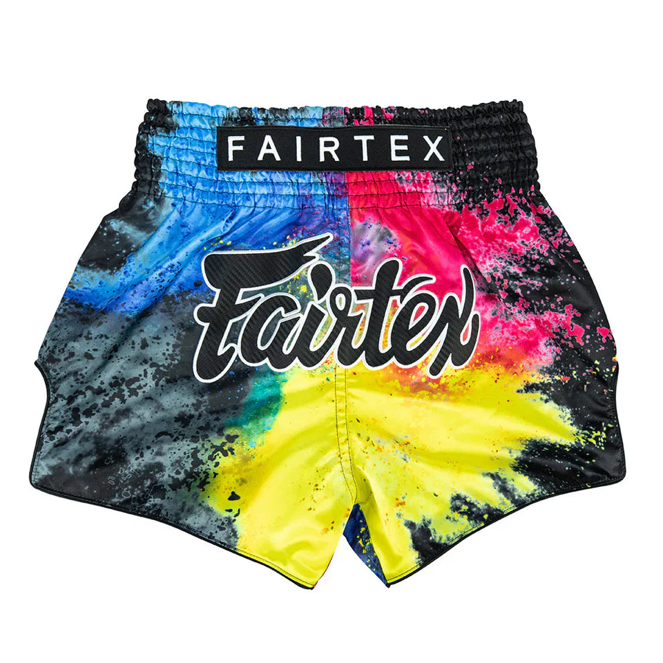 Colorful tie-dye boxing shorts with Fairtex branding on a white background