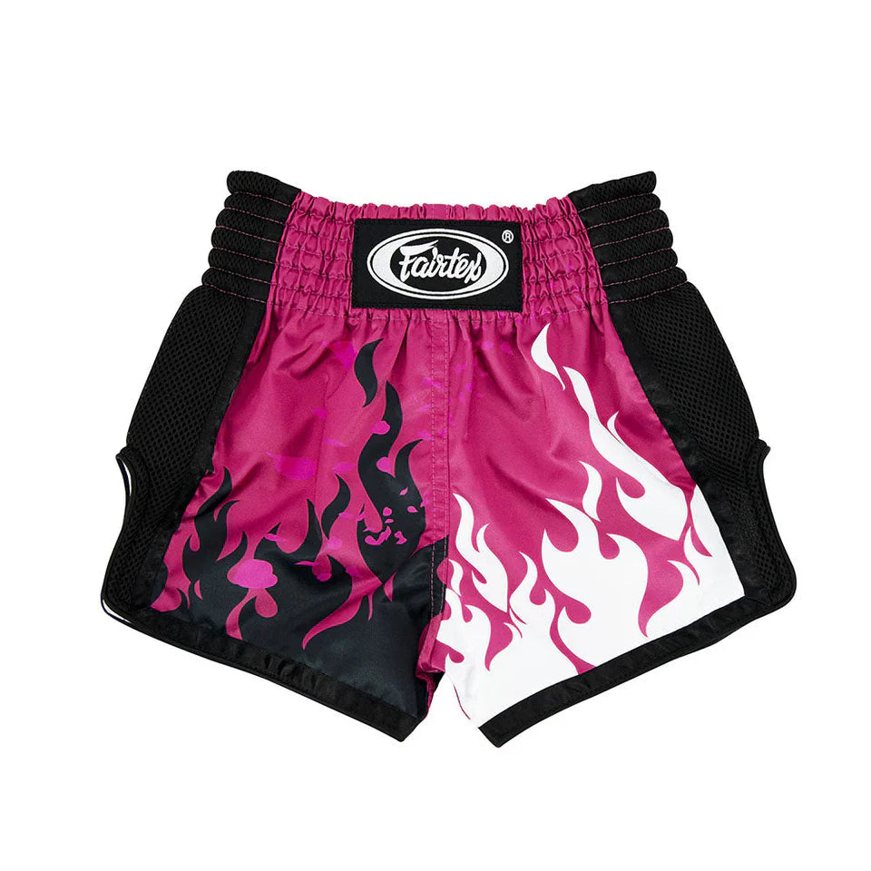 Pink and black boxing shorts with flame design on a white background