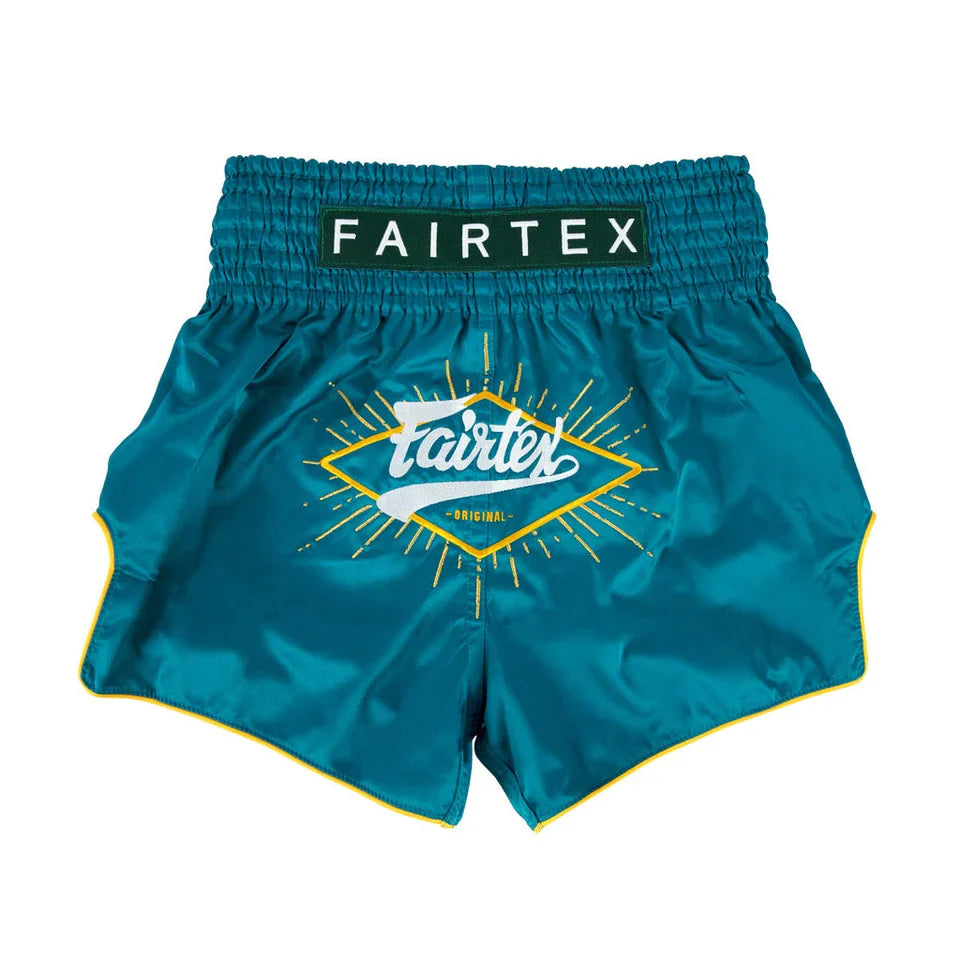 Teal Fairtex boxing shorts with brand logo on a white background