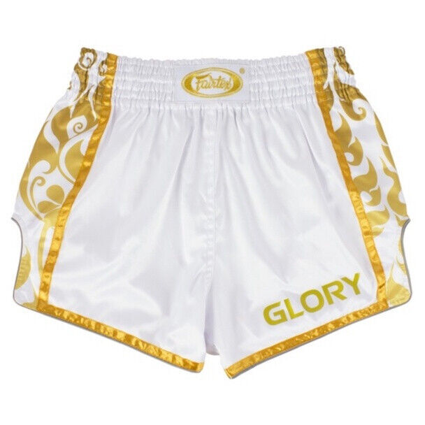 White Muay Thai shorts with gold trim and 'GLORY' text on a white background