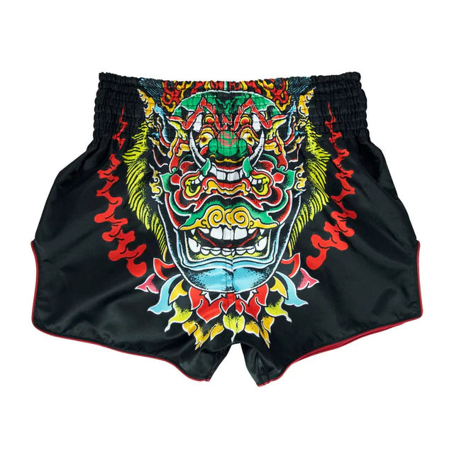 Black Muay Thai shorts with a colorful dragon design on a white background