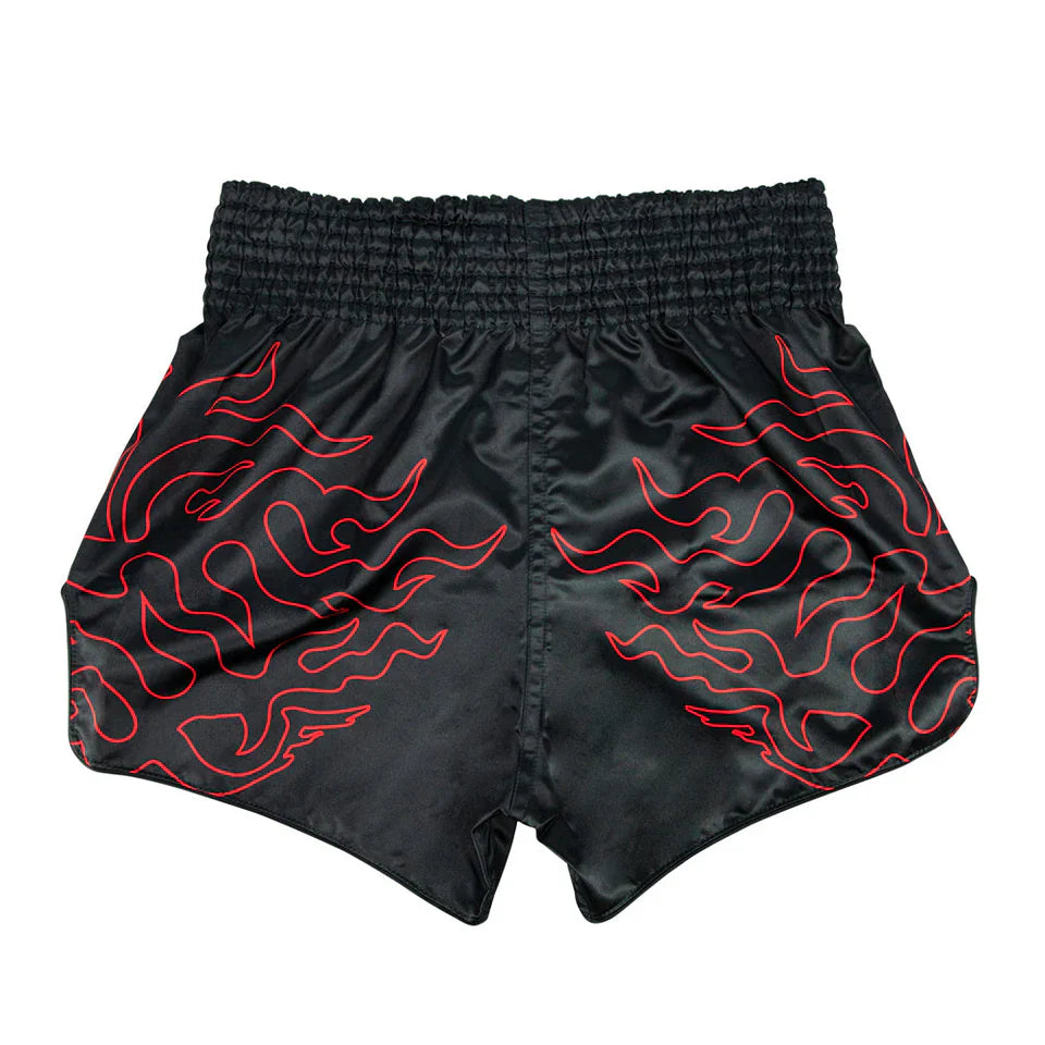 Black Muay Thai shorts with red flame patterns on a white background