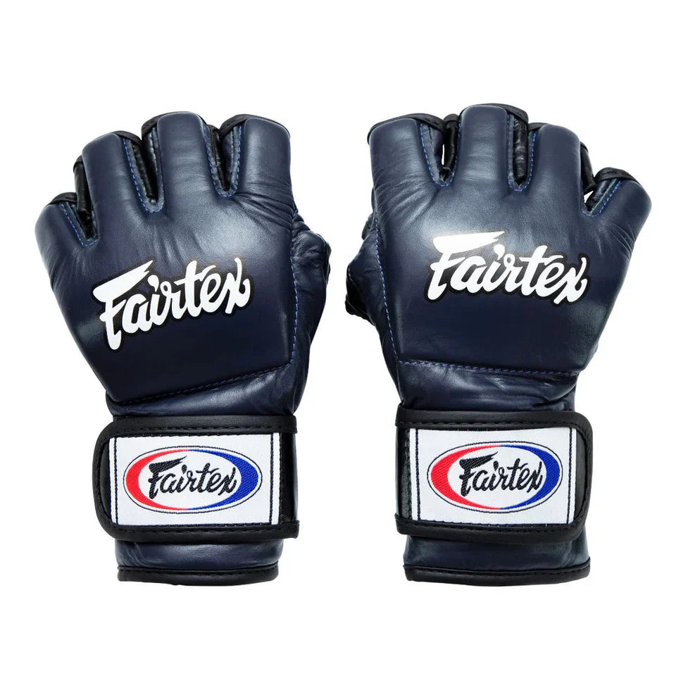 Pair of Navy Fairtex MMA gloves on a white background