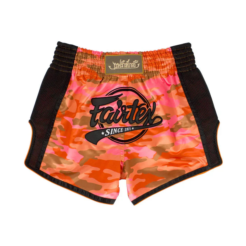 Camouflage Muay Thai shorts with 'Fairtex' branding on a white background