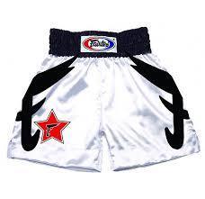 White boxing shorts with a red star and black belt on a white background
