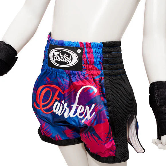 Colorful boxing shorts with Fairtex logo on a white background