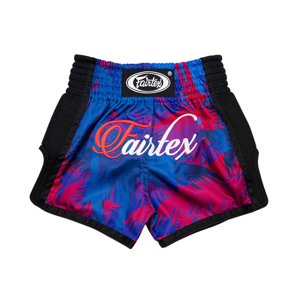 Blue and pink boxing shorts with Fairtex logo on a white background
