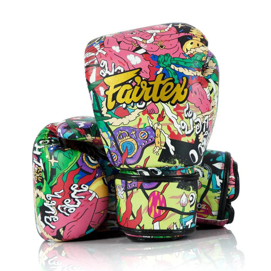 Colorful boxing gloves with a cartoon design and 'Fairtex' branding on a white background.