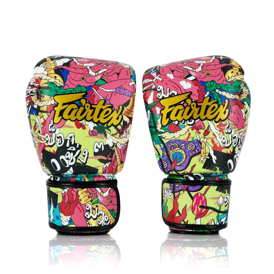 Colorful boxing gloves with 'Fairtex' branding on a white background