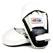 Pair of white and black boxing mitts with Fairtex logo on a white background