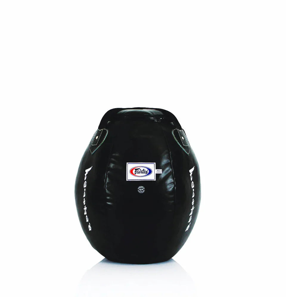 Round black boxing bag with a Fairtex logo on a white background