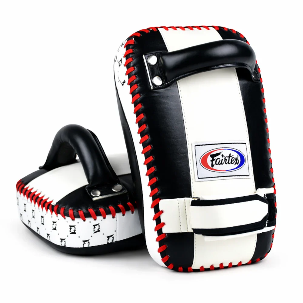Pair of black, white, and red Muay Thai pads with Fairtex logo on a white background