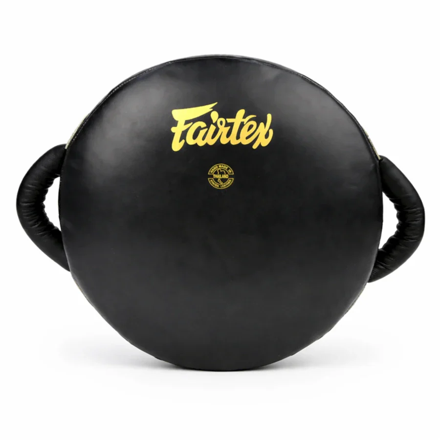 Black round shield with Fairtex logo on a white background