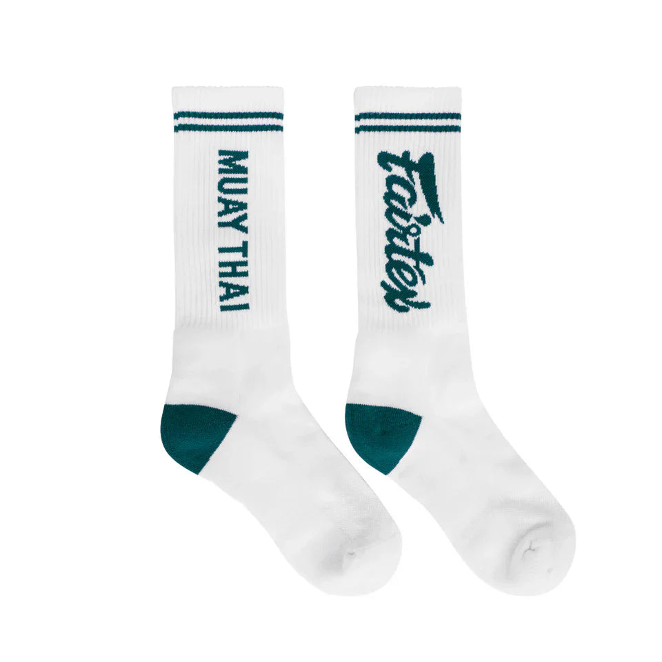 White socks with green text and accents on a white background