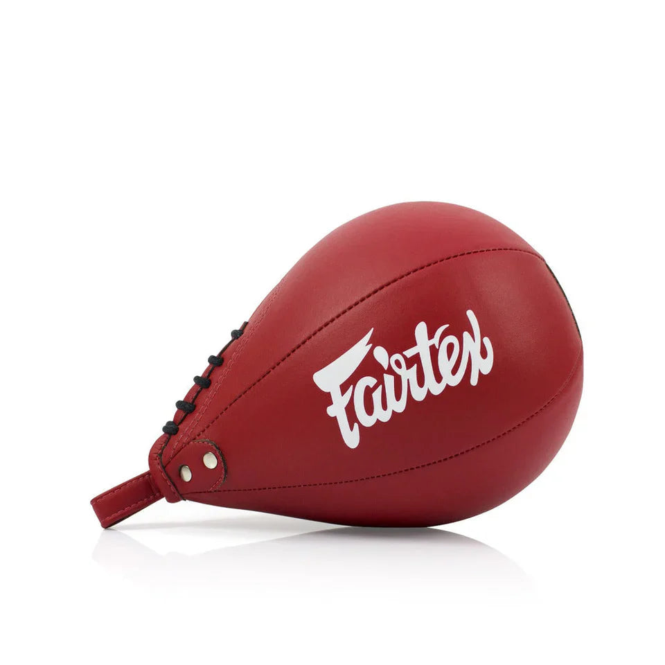Red boxing speed bag with 'Fairtex' branding on a white background