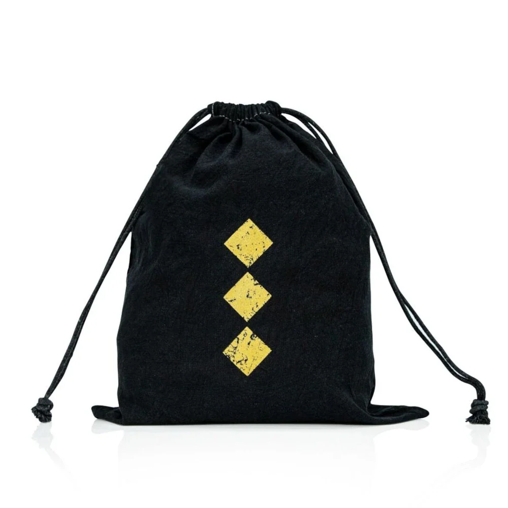 Black drawstring bag with yellow diamond patterns on a white background