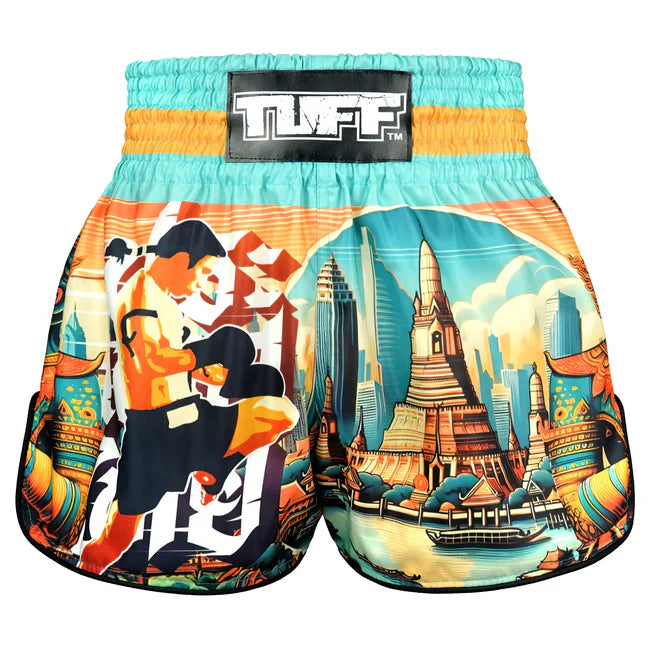 Colourful Thai shorts with a design of a boxer and a temple on a white background