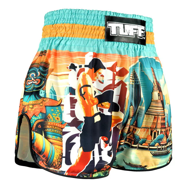 Colourful Thai boxing shorts with a design and 'TUFF' branding on a white background