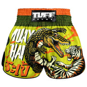 Colorful Muay Thai shorts with crocodile and tiger design on a white background