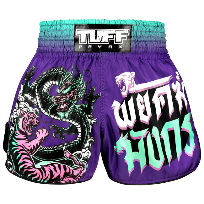 Purple Thai boxing shorts with dragon and tiger design and 'TUFF' branding on a white background