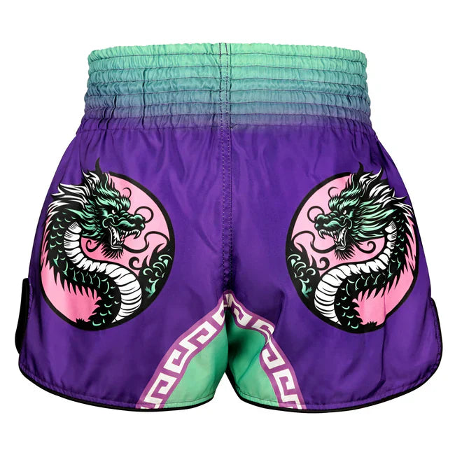Purple Muay Thai shorts with dragon design on a white background