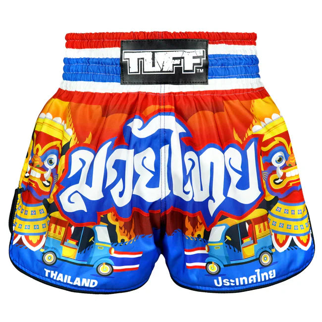 Colourful Muay Thai shorts with traditional design and 'TUFF' brand label on a white background
