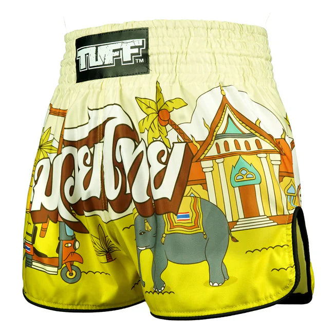Colourful Thai boxing shorts with tropical design and 'TUFF' brand label on a white background